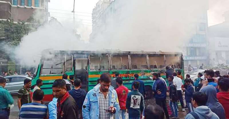 Bus set on fire in Dhanmondi